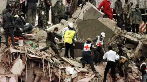Getty Images Rescue effort in the aftermath of the US embassy bombing in Nairobi, Kenya. Photo: August 1998