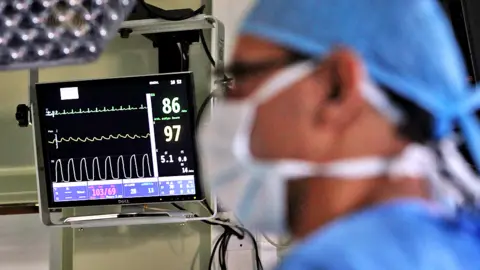 Getty Images Surgeon in operating room