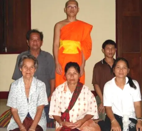 Phra Prasert Panyawaro Phra Prasert with his grandmother, mother, sister-in-law, father and older brother