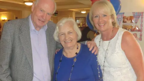 other Sandy Sweet with her parents