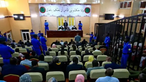 AFP A general view shows the trial of Sudan's ousted president Omar al-Bashir along with 27 co-accused at the Khartoum courthouse