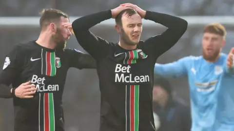 Seanan Clucas looks dejected