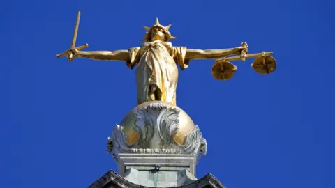 Getty Images Stock pic of figure of justice on top of the Old Bailey in central London