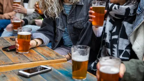 Getty Images Stock image of people at a pub