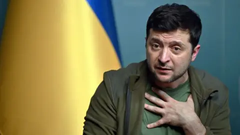 Getty Images Volodymyr Zelensky speaks to the press