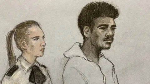 Elizabeth Cook/PA Wire Court artist sketch by Elizabeth Cook of footballer Mason Greenwood appearing in the dock at Manchester Magistrates' Court