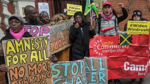 Getty Images Protest against deportation flights