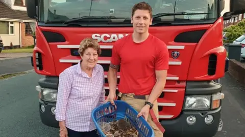 Staffordshire Fire and Rescue Service  Mitch Stafford, Joan Lockley and rescued hedgehogs