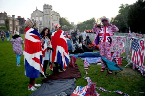 Peter Summers/PA Royal fans on the Long Walk in Windsor ahead of the wedding of Prince Harry and Meghan Markle