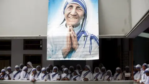 Reuters Catholic nuns from the order of the Missionaries of Charity gather under a picture of Mother Teresa during the tenth anniversary of her death in Kolkata, India, (2007 file pic)