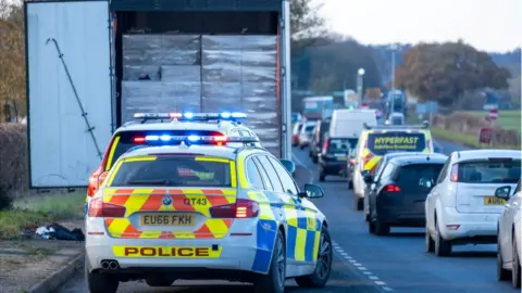 Police next to the lorry