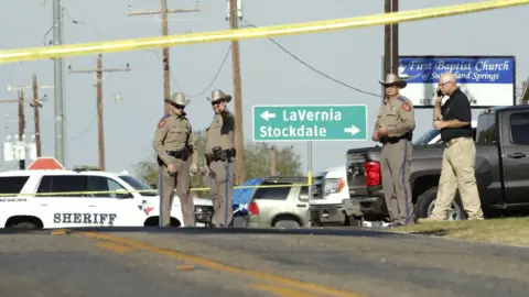 Getty Images Law enforcement officials gather near First Baptist Church