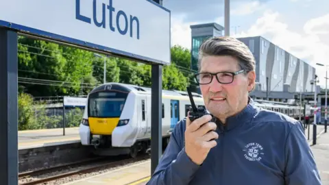 Govia Thameslink Mick Harford recording an announcement at Luton train station