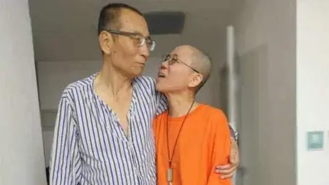 EPA An undated handout photo made available through the twitter account of Guangzhou-based activist Ye Du, shows Chinese dissident Liu Xiaobo (L) with his wife Liu Xia, at an undisclosed location.