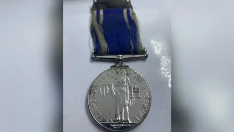 Dave Jordan Medal recovered from river