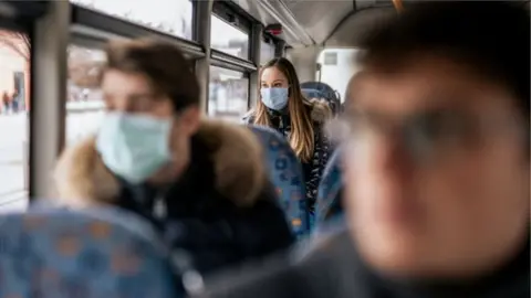 Getty Images Bus passengers