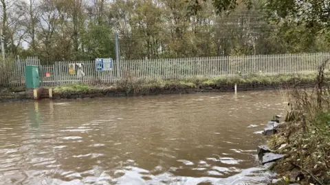 BBC Railway bank and flooded road