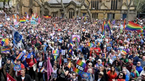 EPA Protestors gathering in central Sydney, thousands are seen with signs and rainbow flags