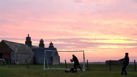 Nina Mackay Boys playing football