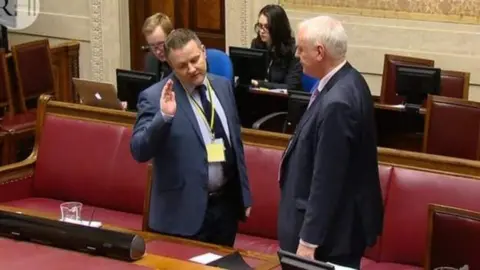 RHI Inquiry Stuart Wightman is sworn in to give evidence
