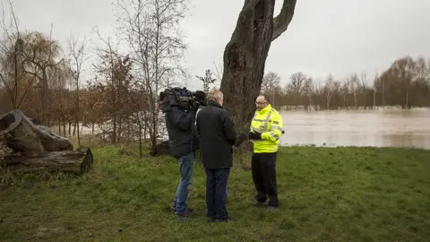 Getty Images Dave Throup, Environment Agency Manager for Herefordshire and Worcestershire, speaks to television journalists near Waterworks Road on February 12, 2014 in Worcester, England