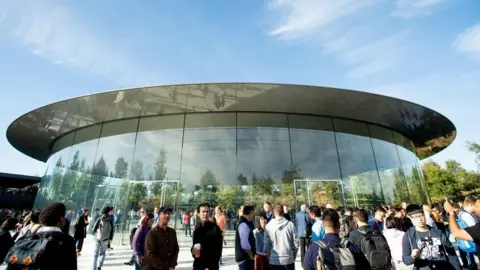 Getty Images Event attendees gather at the Steve Jobs theatre at Apple HQ in 2018