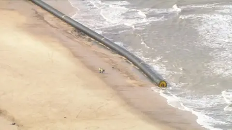 Aerial view of pipeline on the shoreline