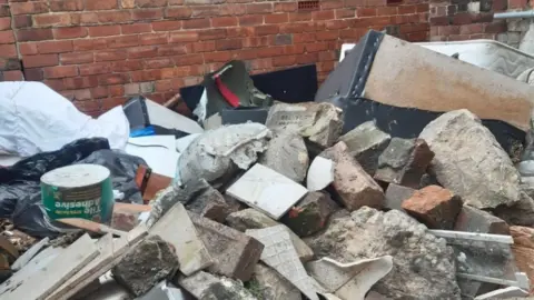 Leeds City Council A photo of the waste dumped by Dixon