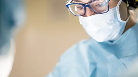 Getty Images Female surgeon.