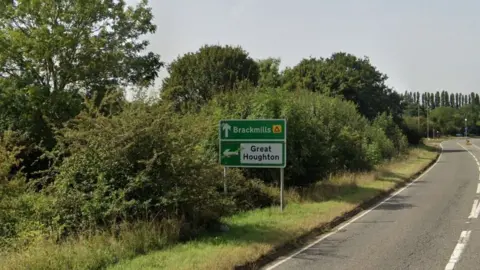 Sign for Great Houghton and Brackmills