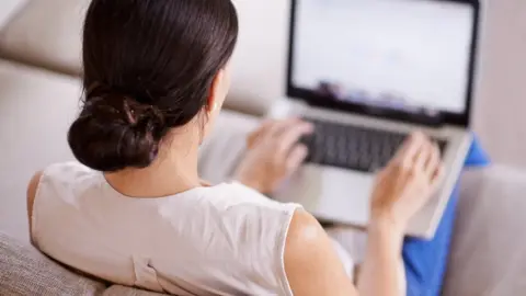 Getty Images Woman on computer