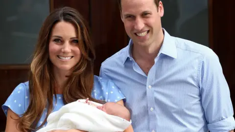 Getty Images George with his parents outside hospital