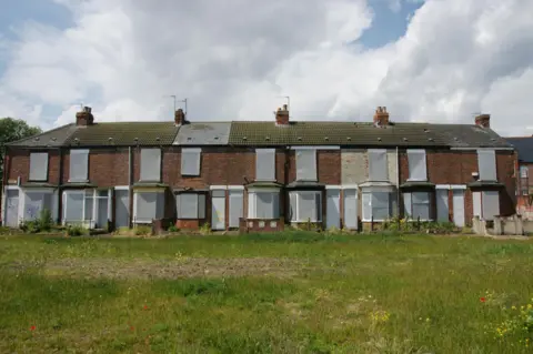 Alamy Slum housing on the edge of the red light district has been demolished in recent years to make way for new homes