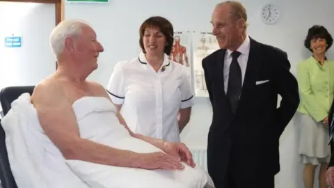 Pacemaker The Duke of Edinburgh meets patients and staff in the physiotherapy unit of the Police Rehabilitation and Retraining Trust