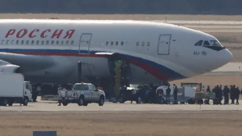 Reuters Russian plane collecting expelled diplomats from Dulles international airport in Chantilly, Virginia, US