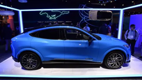 Getty Images A blue Ford Mustang Mach E GT electric car