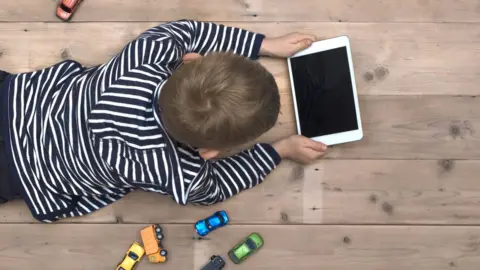 Getty Images Child on iPad