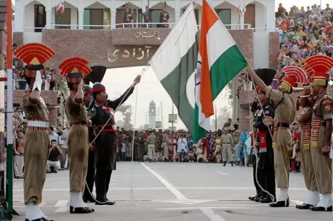 Getty Images Flag lowering ceremony at Wagah border between India and Pakistan