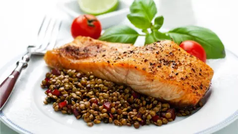 Getty Images Salmon and lentils