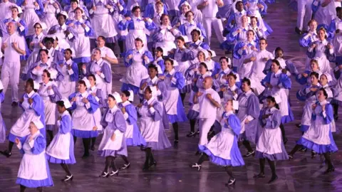 PA Media Dancing nurses at the London 2012 Olympic opening ceremony