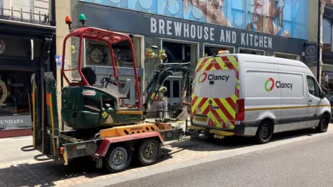 Workman on Bedford High Street