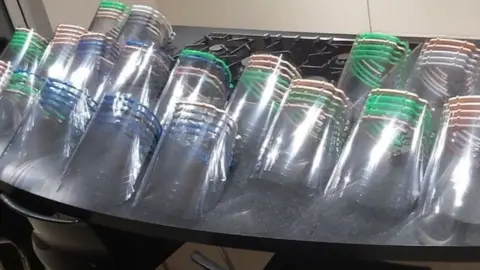 Stephen Lee Face masks in the kitchen