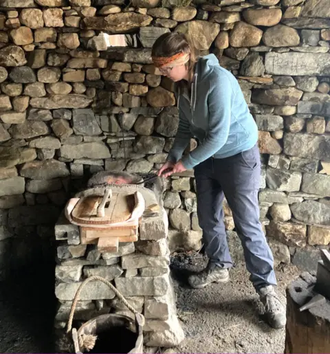 Katie Morrison, trying her hand at blacksmithing