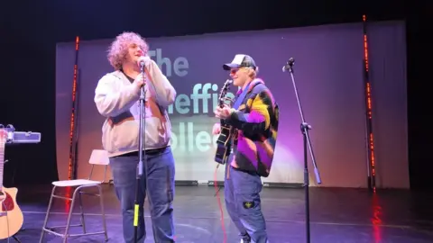 Dan Beale/The Sheffield College Lol Bailey on stage with Ed Sheeran