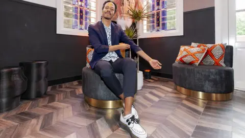 Getty Images Dutch singer Jeangu Macrooy poses during a press meeting on March 5, 2020 in Amsterdam, Netherlands