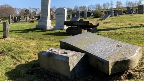 Gravestone toppling has been controversial since being introduced in 2018.