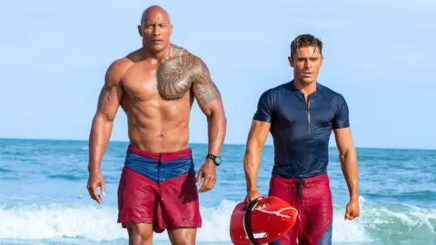PARAMOUNT Dwayne Johnson and Zac Efron