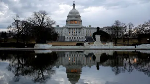 Reuters US Capitol under cloudy skies
