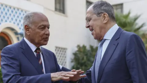 RUSSIAN FOREIGN MINISTRY/EPA Sergei Lavrov (R) with Arab League Secretary General Ahmed Aboul Gheit