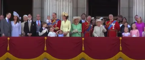 Netflix Footage taken from the new Harry & Meghan trailer of the royal family standing on the Buckingham Palace balcony